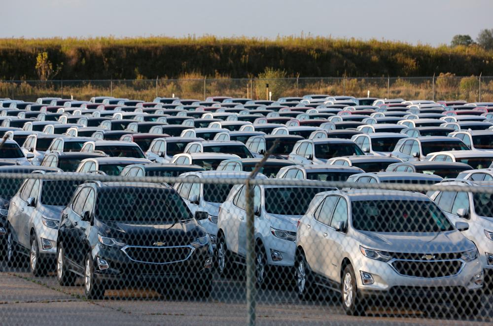 Chevrolet Equinox SUVs are parked awaiting shipment next to the General Motors assembly plant in Ingersoll, Ontario, Canada, in October, 2017. – REUTERSPIX