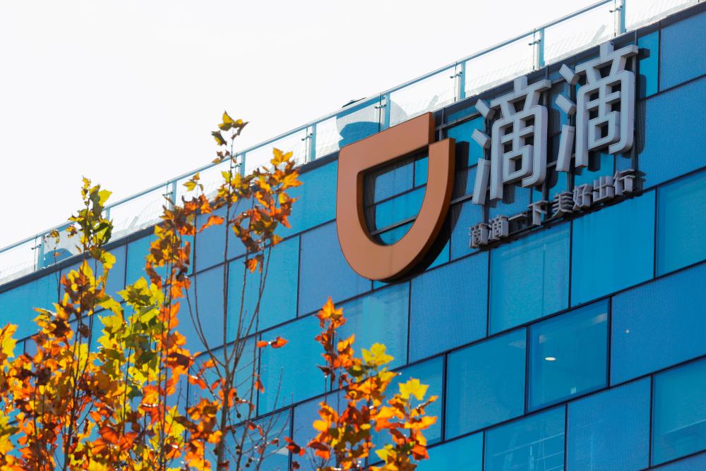 The Didi logo is seen at the headquarters of Didi Chuxing in Beijing – REUTERSPIX