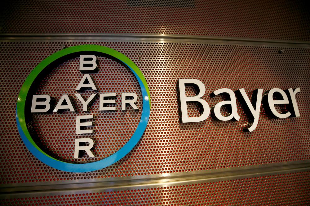 FILE PHOTO: Logo of Bayer AG is pictured at the annual results news conference of the German drugmaker in Leverkusen, Germany February 27, 2019. REUTERS/Wolfgang Rattay/File Photo
