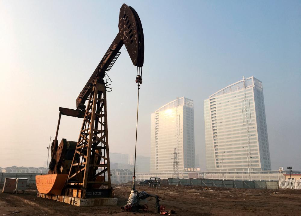 A pumpjack is seen at the Sinopec-operated Shengli oil field in Shandong province, China, in 2017. China is the world’s top oil importer. – Reuterspic
