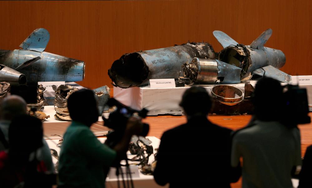 Remains of the missiles which Saudi government says were used to attack an Aramco oil facility are displayed during a news conference in Riyadh, Saudi Arabia Sept 18, 2019. - Reuters