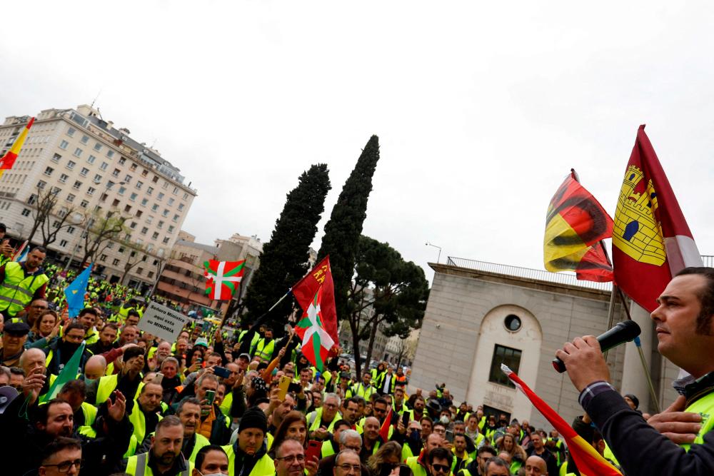 Striking truck drivers and supporters protest over high fuel prices and working conditions, in Madrid/REUTERSPix