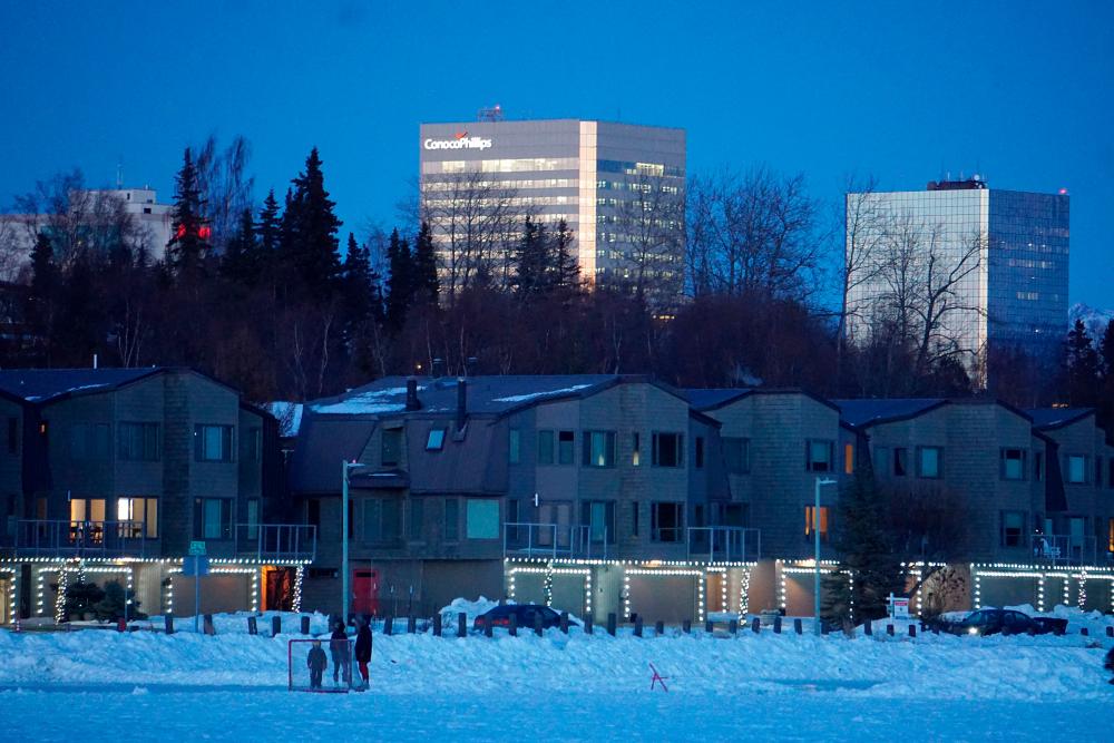 The ConocoPhillips Alaska Inc building overlooking the frozen Westchester Lagoon on a winter’s evening in downtown Anchorage, Alaska in February 2020. – Reuterspic