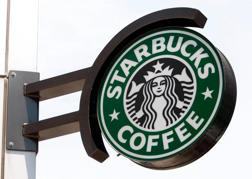 The Starbucks sign is seen outside one of its stores in New York. The company plans to grow its global store count to 55,000 by 2030 – from more than 38,000 currently. – Reuterspic