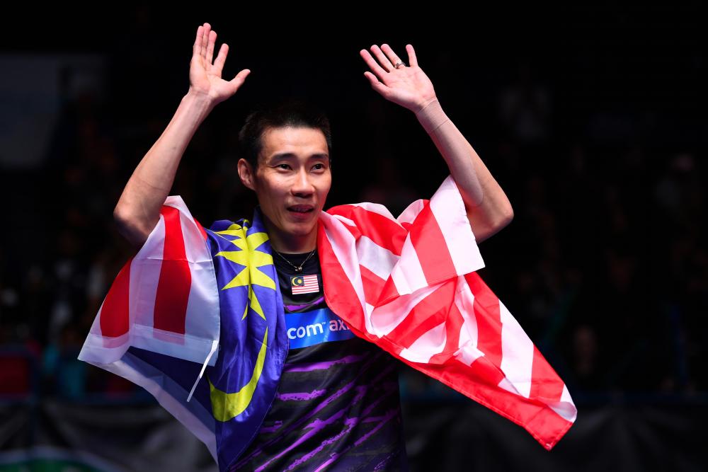 In this file photo taken on March 12, 2017, Datuk Lee Chong Wei celebrates his victory over China's Lin Dan in their All England Open Badminton Championships men's singles final match in Birmingham, central England. - AFP