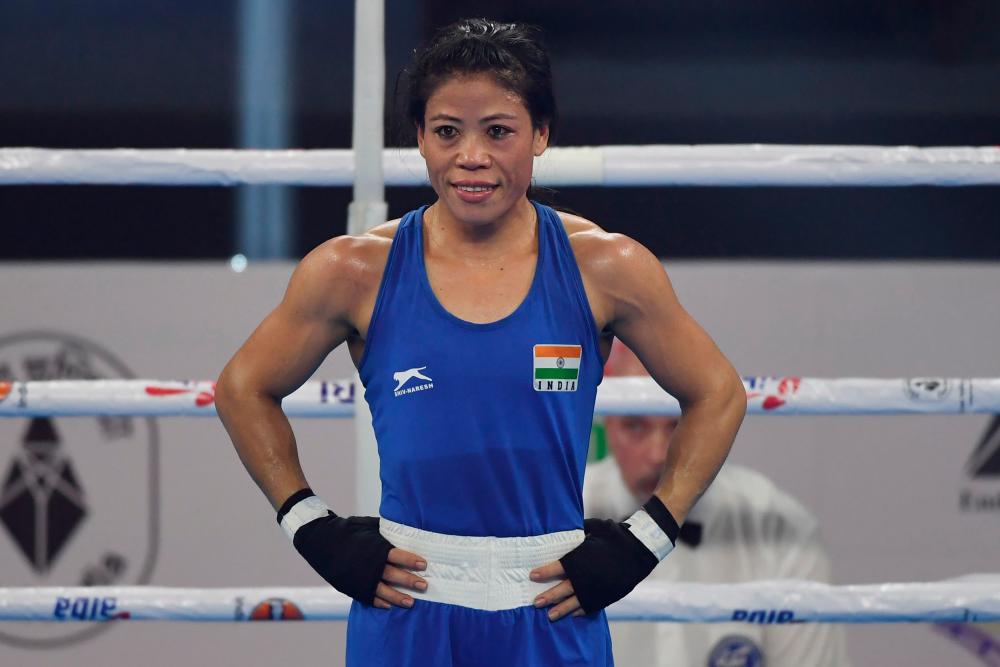 In this file photo taken on Nov 22, 2018 Mary Kom of India reacts after winning a match at the 2018 AIBA Women's World Boxing Championships in New Delhi. — AFP