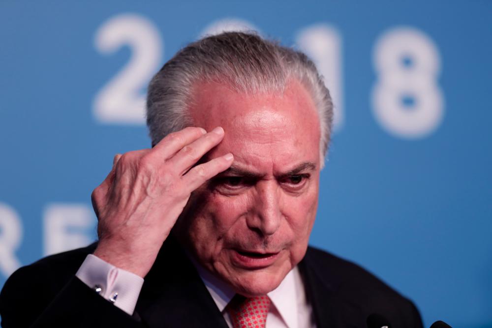 In this file photo taken on Nov 30, 2018 Brazil's President Michel Temer delivers a press conference on the first day of the G20 Leaders Summit in Buenos Aires. — AFP