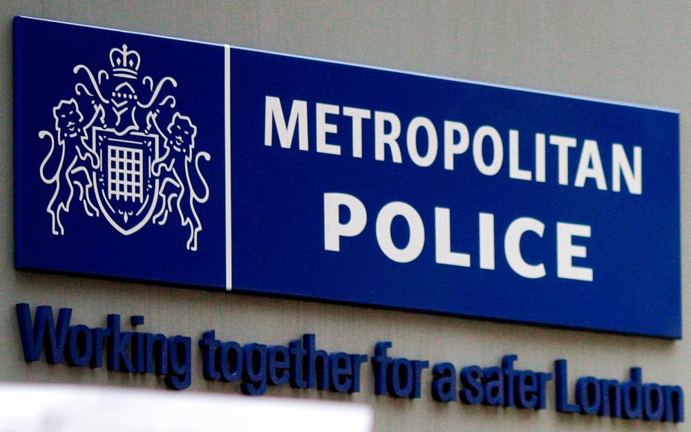 This file photo taken on April 16, 2009 show the Met Police sign outside New Scotland Yard in central London. AFPPIX