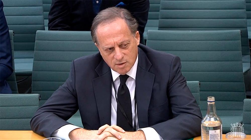 In this file video grab taken from footage broadcast by the UK Parliament’s Parliamentary Recording Unit (PRU) on February 7, 2023 shows BBC chairperson Richard Sharp testifying in front of a Digital, Culture, Media and Sport (DCMS) Committee in London Sharp announced his resignation on April 28, 2023 over involvement in securing a private credit line for up to £800,000 ($990,000) for the then-PM Boris Johnson from a Canadian businessman/AFPPix