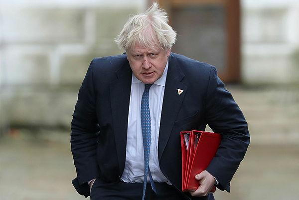 In this file photo taken on March 07, 2018 Britain’s then Foreign Secretary Boris Johnson arrives in Downing Street in London. — AFP