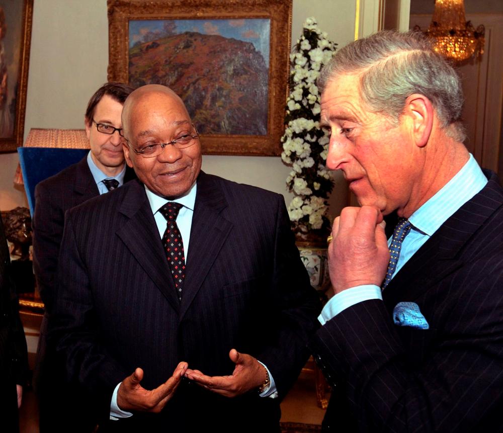 In this file photo taken on March 5, 2010 Britain’s Prince Charles (R) talks to South African President Jacob Zuma at Clarence House in London, on the last day of his State Visit to Britain./AFPPix