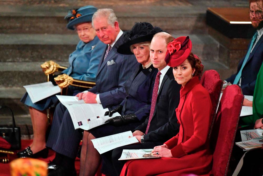 FILES) In this file photo taken on March 09, 2020 (L-R) Britain’s Queen Elizabeth II, Britain’s Prince Charles, Prince of Wales, Britain’s Camilla, Duchess of Cornwall, Britain’s Prince William, Duke of Cambridge, and Britain’s Catherine, Duchess of Cambridge sit inside Westminster Abbey as they attend the annual Commonwealth Service in London on March 9, 2020. - AFP