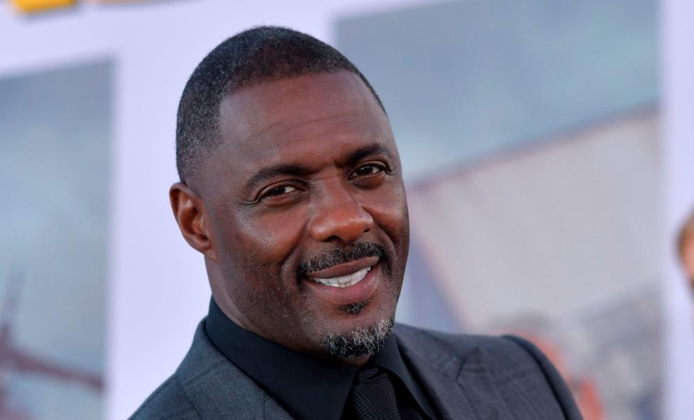 FILES) In this file photo taken on July 13, 2019 English actor Idris Elba attends the world premiere of “Fast &amp; Furious presents Hobbs &amp; Shaw,“ at the Dolby Theatre in Hollywood California. / AFP / Chris Delmas