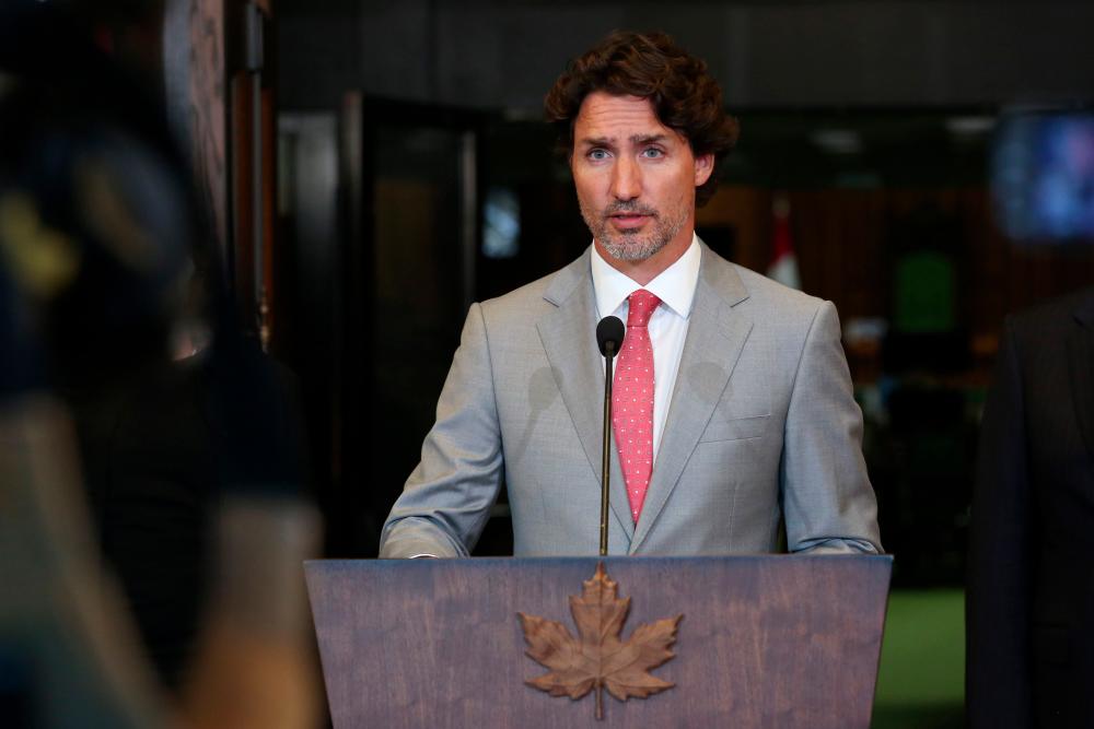 In this file photo Canada’s Prime Minister Justin Trudeau speaks during a news conference on Parliament Hill Aug 18, 2020 in Ottawa, Canada. — AFP