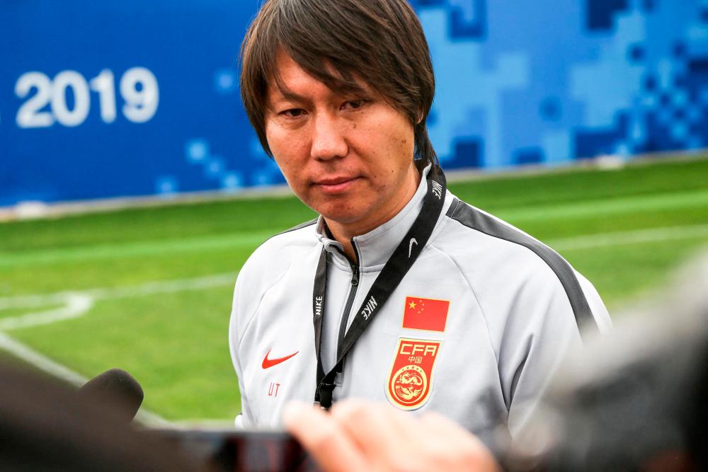 Filepix: This photo taken on November 6, 2019 shows Li Tie, then head coach of the Chinese national men’s football selection team, taking part in a training session in Wuhan in China’s central Hubei province/AFPPix