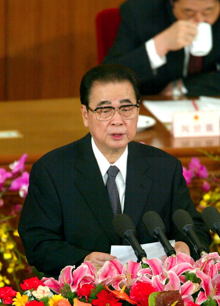 This file photo taken on March 10, 2003 shows National People's Congress (NPC) Chairman Li Peng making his final address at the Great Hall of the People in Beijing. Former Chinese premier Li Peng — known as the Butcher of Beijing for his role in the Tiananmen Square killings — died aged 91, the state broadcaster said on July 23, 2019. — AFP