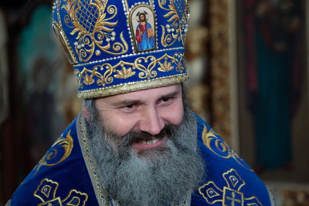 In this file photo taken on Feb 15, 2019 Father Kliment, the head of the Cathedral of Saint Vladimir and Saint Olga in Simferopol, smiles during an interview. — AFP