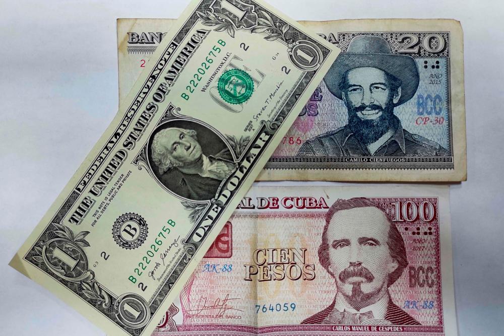 Cuba announces surprise reversal of US dollar deposit ban