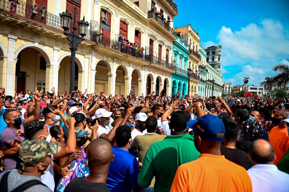 In this file photo taken on July 11, 2021 People take part in a demonstration against the government of Cuban President Miguel Diaz-Canel in Havana. AFPpix