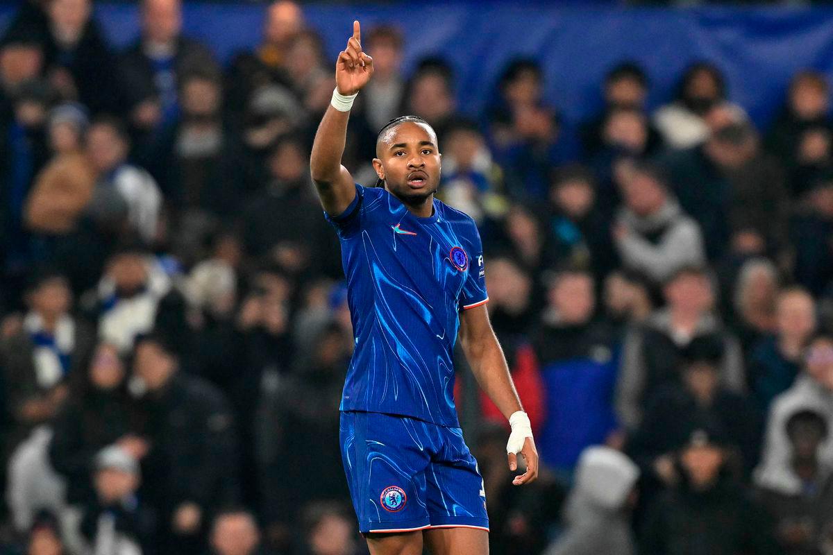 Chelsea's French striker #18 Christopher Nkunku celebrates scoring the team's seventh goal during the UEFA Europa Conference League, League Stage football match between Chelsea and FC Noah at Stamford Bridge in London on November 7, 2024. Chelsea's French striker Christopher Nkunku is leaving Chelsea to join AC Milan, both clubs confirmed on August 30, 2025. - AFP