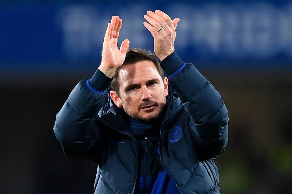 In this file photo taken on March 3, 2020 Chelsea's English head coach Frank Lampard applauds the fans following during the English FA Cup fifth round football match between Chelsea and Liverpool at Stamford Bridge in London. Chelsea manager Frank Lampard believes it is unrealistic to push and push players to maintain their fitness levels during the coronavirus pandemic with no concrete timetable as to when football will return, he said in a FaceTime interview with Chelsea's official club app. on March 27. — AFP