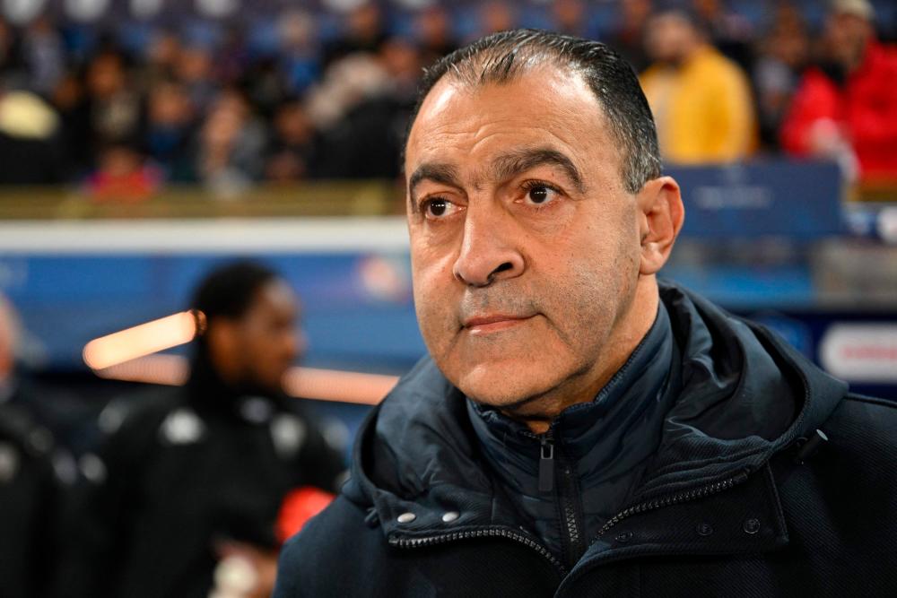 Angers’ Moroccan coach Abdel Bouhazama looks on prior to the French cup round of 64 football match between RC Strasbourg Alsace and Angers SCO at the Stade de la Meinau in Strasbourg, eastern France, on January 6, 2023/AFPPix