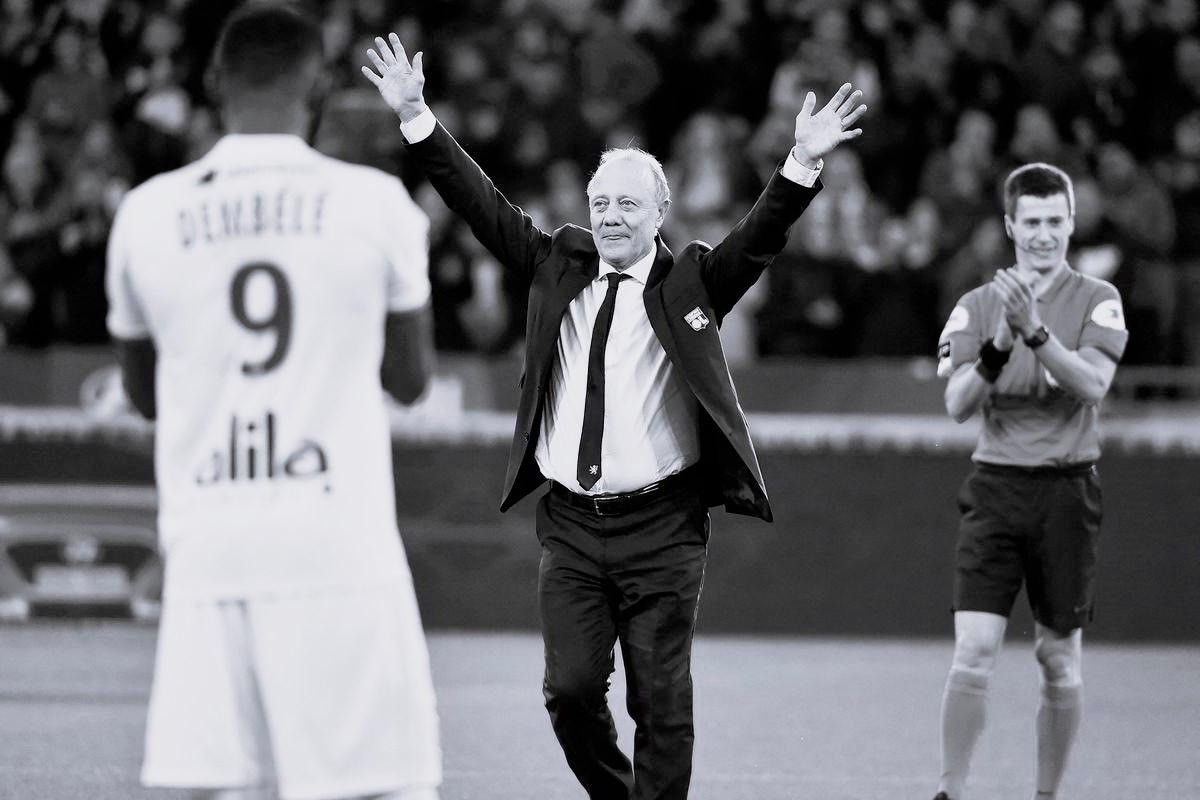 Special advisor to Lyon's president, former player Bernard Lacombe (C) celebrates his retirement on the pitch ahead of the French L1 football match between Olympique Lyonnais and Stade Rennais Football Club at the Groupama stadium in Decines-Charpieu near Lyon, central eastern France on December 15, 2019. - AFPPIX