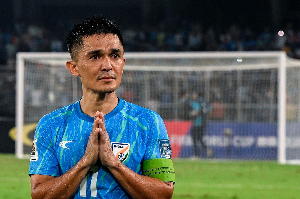 (FILES) India’s captain Sunil Chhetri greets his fans at the end of the FIFA World Cup 2026 Asia qualifier match between India and Kuwait at the Salt Lake Stadium in Kolkata on June 6, 2024. - DIBYANGSHU SARKAR / AFP