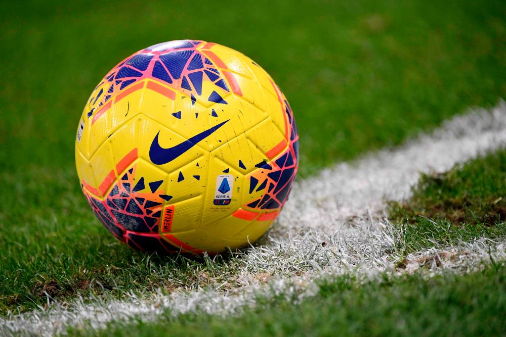 In this file photo taken on December 21, 2019 An official Serie A ball is pictured during the Italian Serie A football match Inter Milan vs Genoa at the San Siro stadium in Milan. The Italian Football Federation (FIGC) announced on May 20, 2020 that the season has been extended until August 20, 2020 with the hope of concluding all professional championships. / AFP / Marco Bertorello
