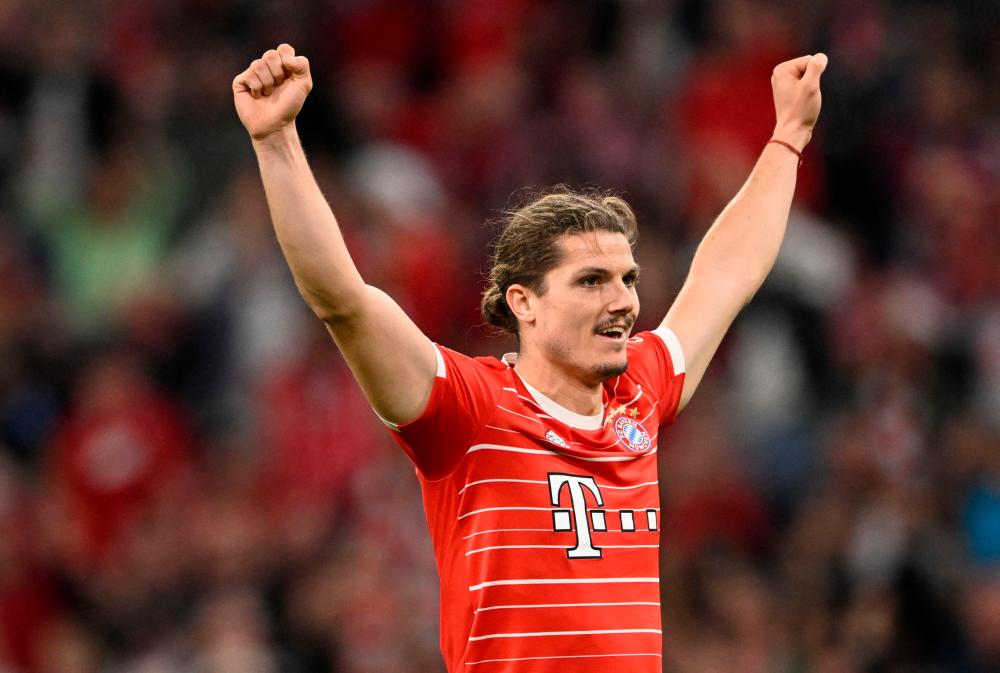 In this file photo taken on October 16, 2022 Bayern Munich’s Austrian midfielder Marcel Sabitzer celebrates scoring the 5-0 goal during the German first division Bundesliga football match between FC Bayern Munich and SC Freiburg in Munich, southern Germany on October 16, 2022/AFPPix