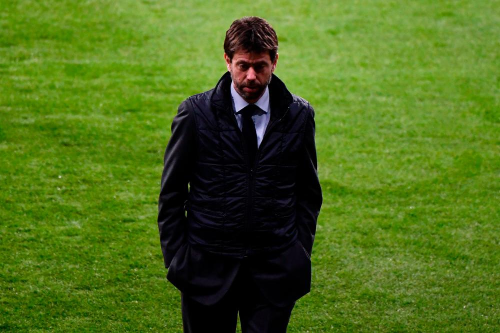 In this file photo taken on February 19, 2019 Juventus’ Italian president Andrea Agnelli stands on the pitch during a walk-around at the Wanda Metropolitan stadium in Madrid ahead of the UEFA Champions League round of 16 first leg football match between Atletico Madrid and Juventus/AFPPix