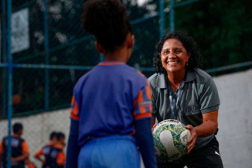 Women’s football coach Dilma Mendes, 59, participates in a training session at the Arena 2 de Julho Football School located in the city of Camacari, Bahia state, Brazil, on July 5, 2023/AFPPix