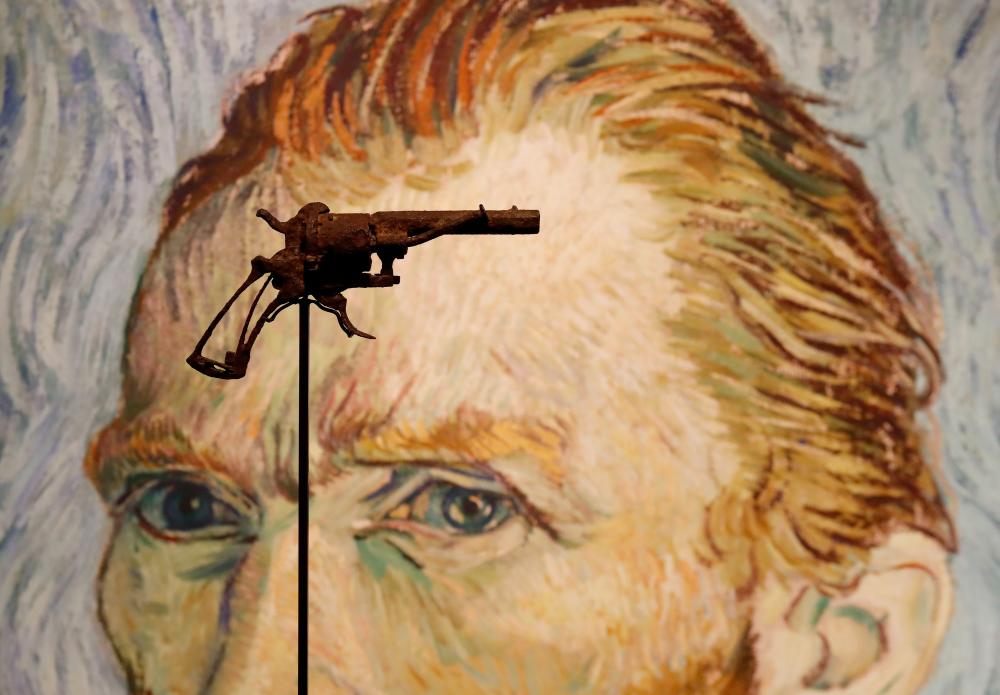 In this file photo taken on June 14, 2019 a revolver believed to be the gun Dutch 19th century painter Vincent Van Gogh used to kill himself on 27 July 1890 is on public display at Paris' Drouot auction house. — AFP