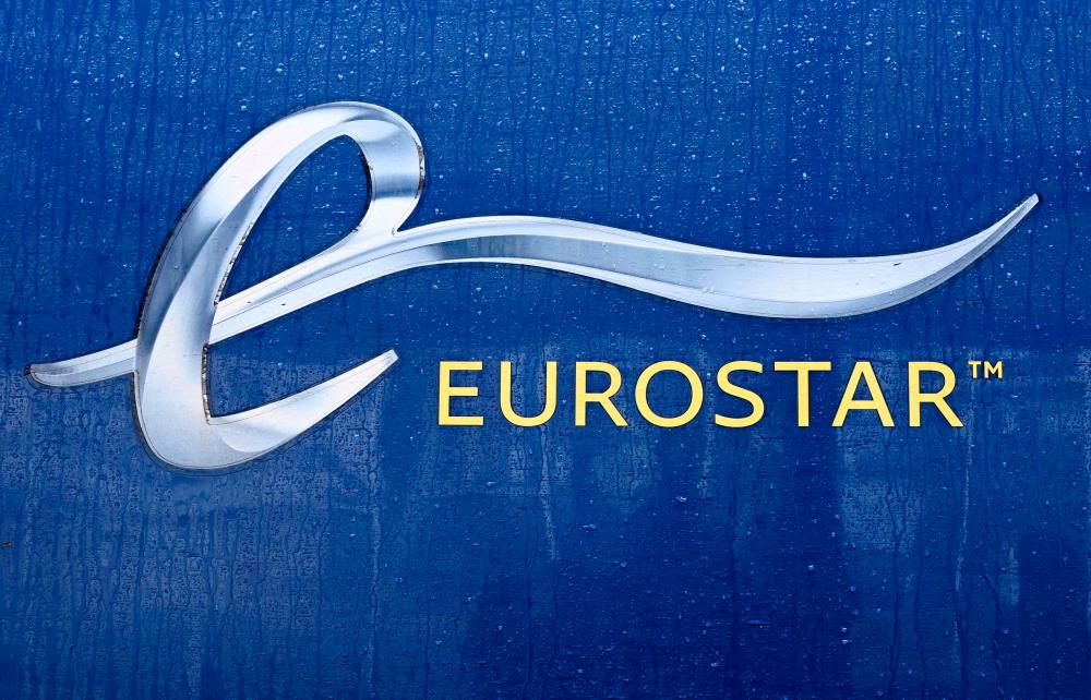 (FILES) The Eurostar logo is pictured on a train parked at a platform of the Paris' Gare du Nord station on August 3, 2023. - AFPPIX