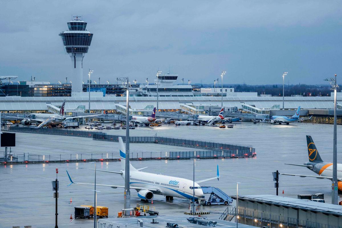 (FILES) General view of Munich International Airport in Munich, southern Germany, on early February 20, 2024. Germany’s Munich airport said normal service resumed on early October 3, 2025 after several drone sightings forced its closure on late October 2, 2025, the latest in a string of similar aviation disruptions across Europe. (Photo by Michaela STACHE / AFP)