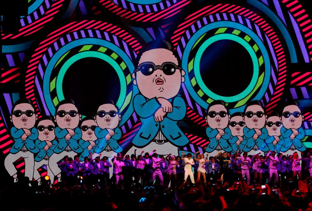 (FILES) In this file picture taken on November 11, 2012, South Korean rapper Psy performs during the 2012 MTV European Music Awards (EMA) at the Festhalle in Frankfurt am Main, central Germany. AFPPIX