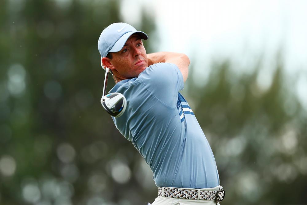 In this file photo taken on May 17, 2020, Rory McIlroy of Northern Ireland plays his shot from the ninth tee during the TaylorMade Driving Relief Supported By UnitedHealth Group at Seminole Golf Club in Juno Beach, Florida. - AFP