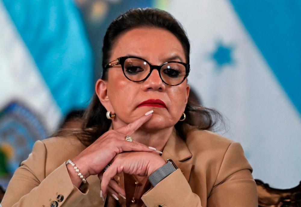 n this file photo taken on November 24, 2022, Honduras’ President Xiomara Castro gestures during the launching of the “Integral Plan for the Treatment of Extortion and Related Crimes”, which aims to tackle the local ‘maras’ (gangs), at the Presidential House in Tegucigalpa. AFPPIX
