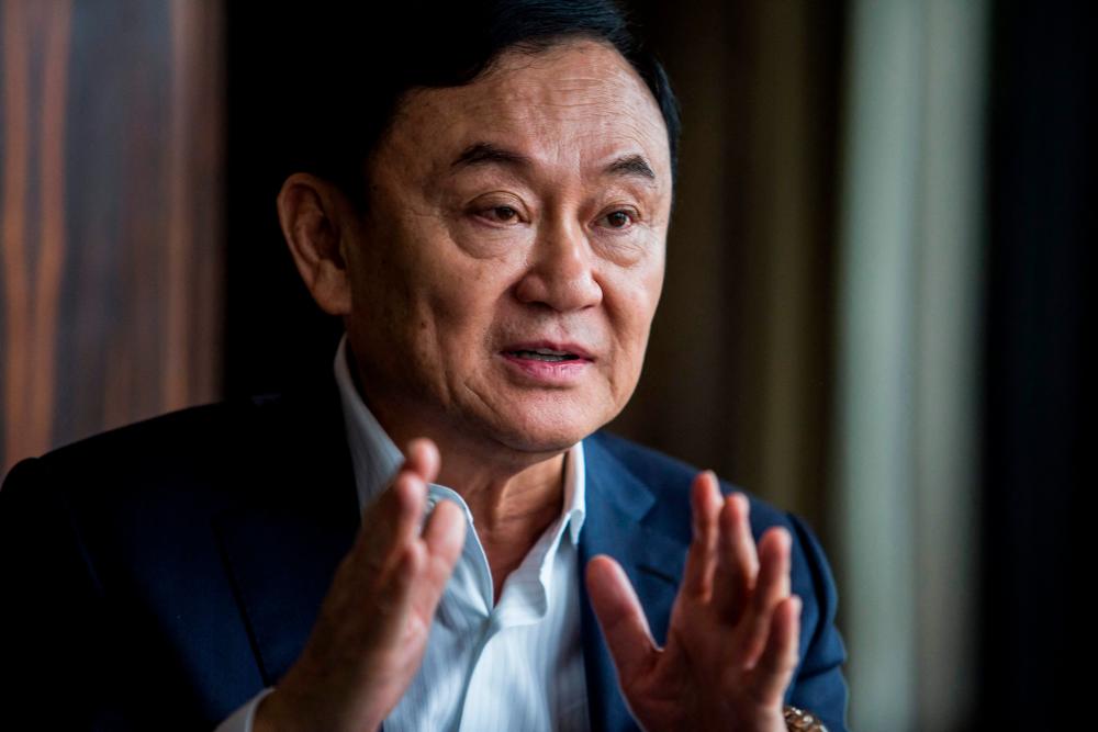 This file photo taken on March 25, 2019 shows exiled former Thai prime minister Thaksin Shinawatra during an interview with AFP in Hong Kong/AFPPix
