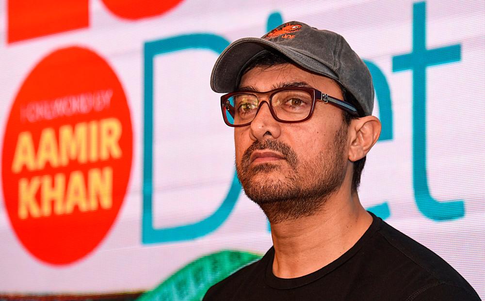 In this file photo taken on March 27, 2019 Indian Bollywood actor Aamir Khan looks on during the launch of a book about weight loss in Mumbai. — AFP