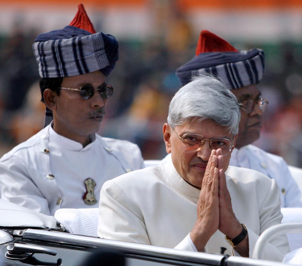 (FILES) In this file photo taken on January 26, 2007, the then West Bengal Governor Gopalkrishna Gandhi greets spectators during a Republic Day Parade in Kolkata. AFPPIX