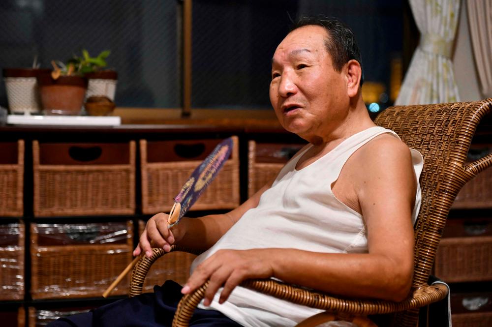 This file picture taken on August 28, 2018 shows Japanese former professional boxer Iwao Hakamada, who was sentenced to death for the murder of four members of a family in 1968, speaking during an interview with AFP in Hamamatsu, Shizuoka prefecture. AFPPIX