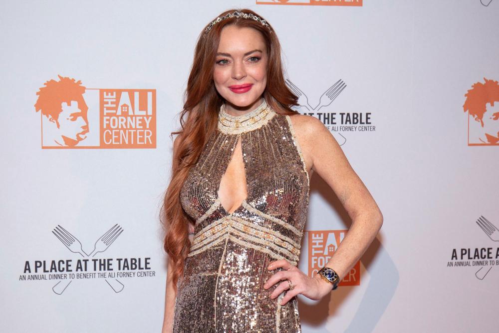 (FILES) In this file photo taken on October 24, 2019 Lindsay Lohan attends the 2019 Ali Forney Center Gala at Cipriani Wall Street in New York City. AFPPIX