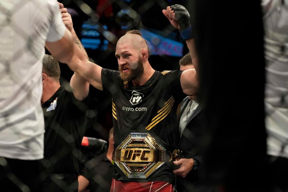 (FILES) This file photo taken on June 12, 2022 shows Czech Republic's Jiri Prochazka celebrating his win against Brazil's Glover Teixeira in their men's light heavyweight title match during the Ultimate Fighting Championship (UFC) 275 event in Singapore. AFPPIX