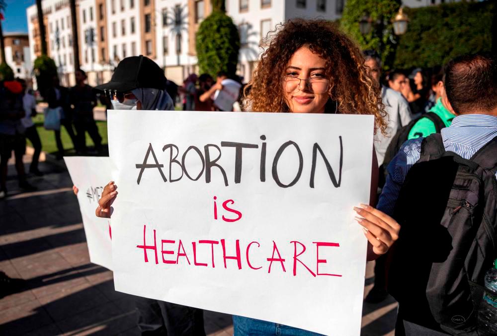 In this file photo taken on September 28, 2022, Moroccan activists demonstrate in the capital Rabat, after 14-year-old Meriem died as a result of an unsafe secret abortion/AFPPix