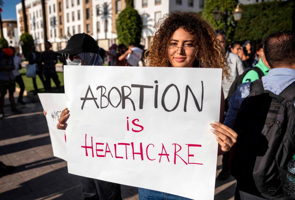 In this file photo taken on September 28, 2022, Moroccan activists demonstrate in the capital Rabat, after 14-year-old Meriem died as a result of an unsafe secret abortion/AFPPix
