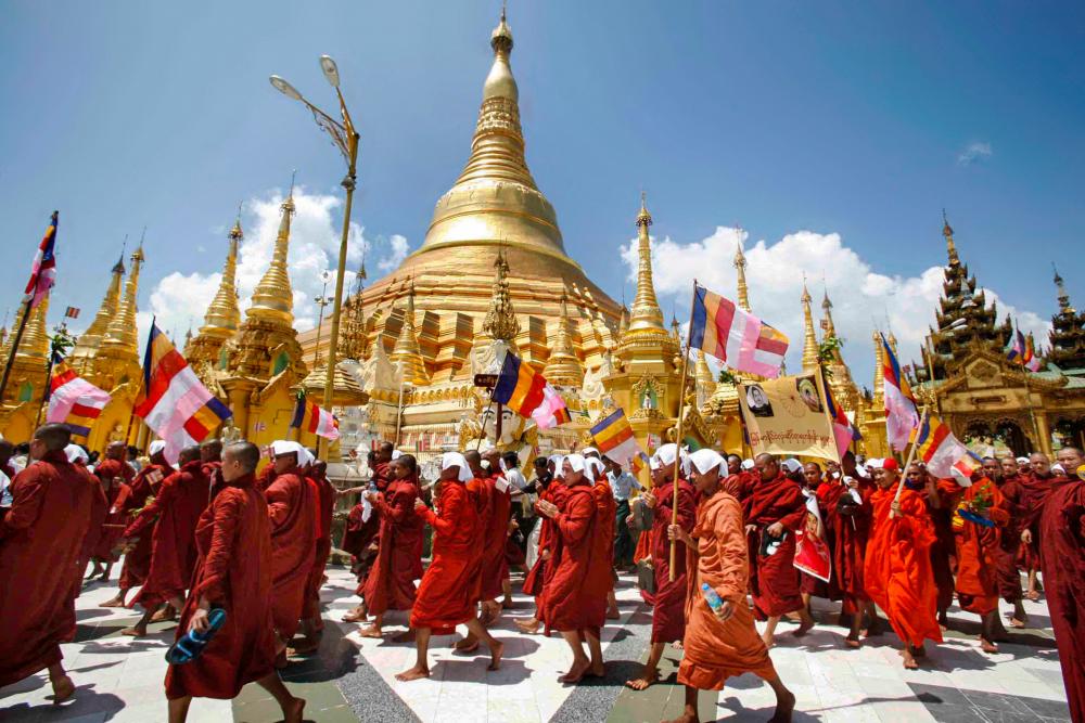 (FILES) In this file photo taken on September 25, 2007, Buddhist monks march down a street in protest in Yangon, despite stern warnings from Myanmar’s junta against anti-government demonstrations. - AFP