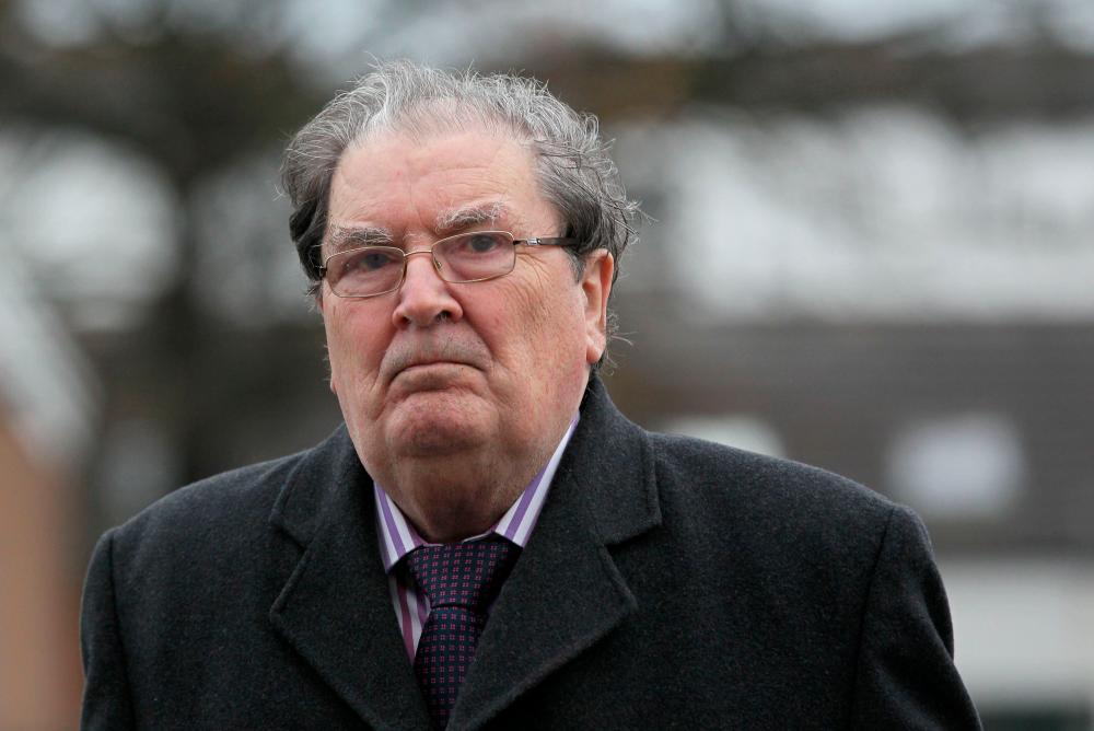 In this file photo taken on Nov 27, 2013 former Northern Ireland politician and Joint 1998 Nobel Peace Prize Winner, John Hume, attends the funeral service for Irish priest Father Alec Reid at Clonard Monastery in Belfast, Northern Ireland. — AFP