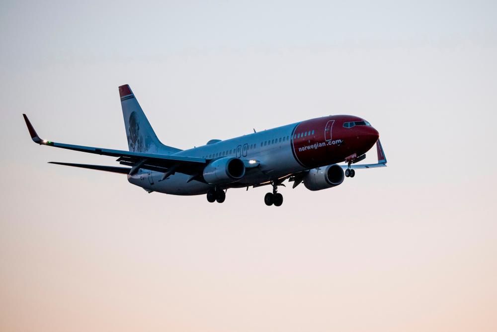 Photo taken in March 2020 shows a Norwegian Air plane approaching Arlanda airport, north of Stockholm. – AFPPIX