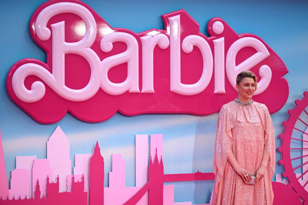 US director Greta Gerwig poses on the pink carpet upon arrival for the European premiere of “Barbie” in central London on July 12, 2023. AFPPIX